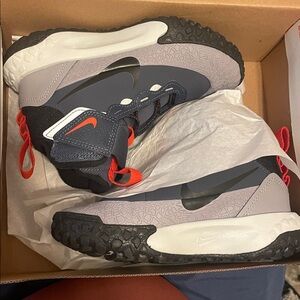 Nike Youth Navy and Gray Sneakers with Red Highlights